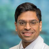Atin Saha, MD