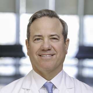 Charles Mack, MD