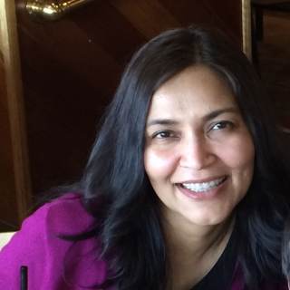 Amra Nasir, MD