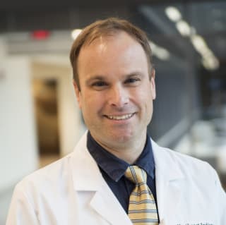 Adam Thomas, MD