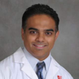 Varghese Cherian, MD