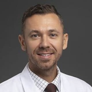 Tolga Suvar, MD