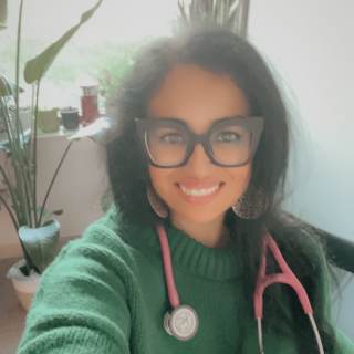 Preyasha Tuladhar, MD