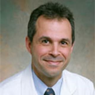 Carlos Alvarez, MD