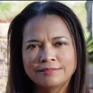 Lucia Ferreras-Cox, MD