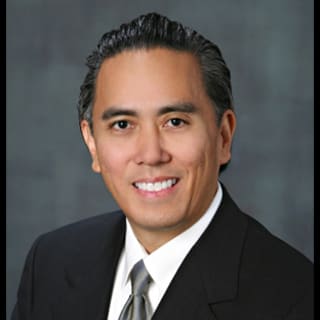 Charles Ariz, MD