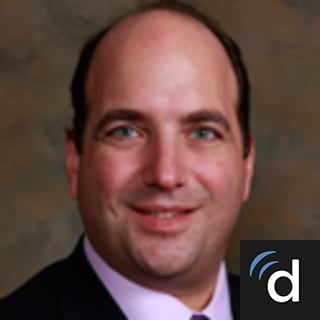 Caner Dinlenc, MD