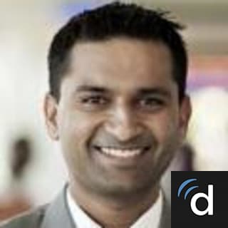 M Thomas, MD