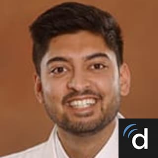 S Akbar Husain, MD
