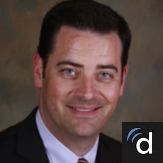 Curtiss Stinis, MD