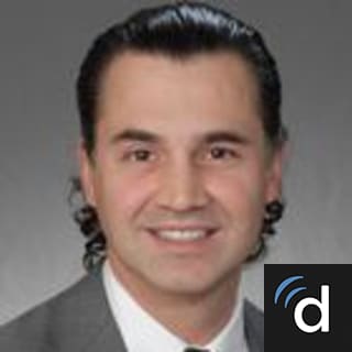 Evan Tzakis, MD