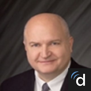 J Cameron, MD