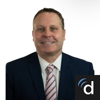 John Six, MD