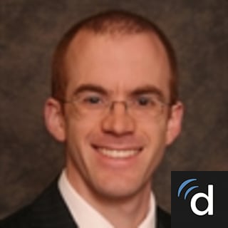 Travis Fisher, MD