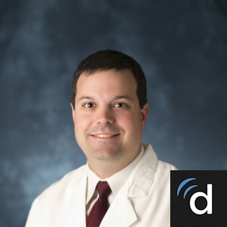 Cyrus Caroom, MD