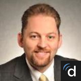 K. Thomas, MD