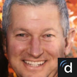 Louis Komer, MD
