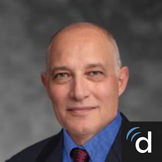 T. Woll, MD