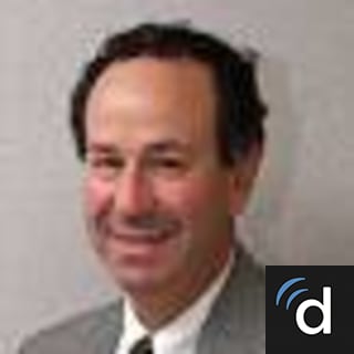 Louis Gold, MD