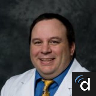 Greg Den Haese, MD