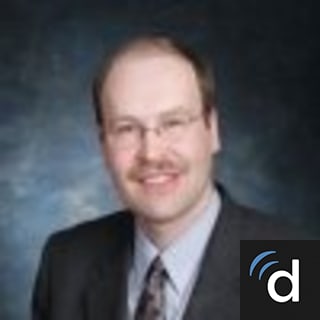 E. Albert Tzeel, MD