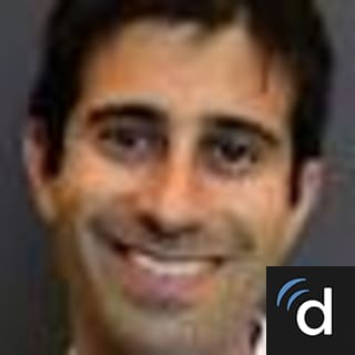 Travis Lewis, MD